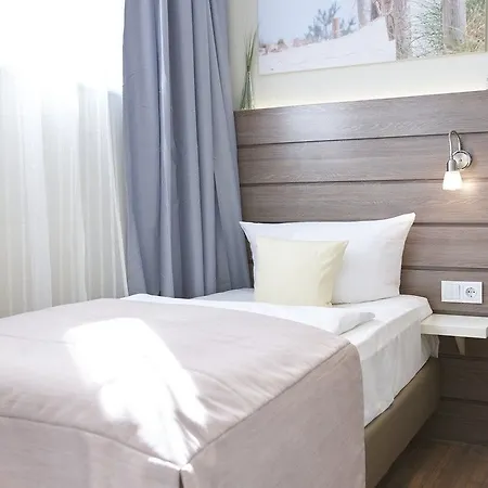 By Golden Tulip Hotel